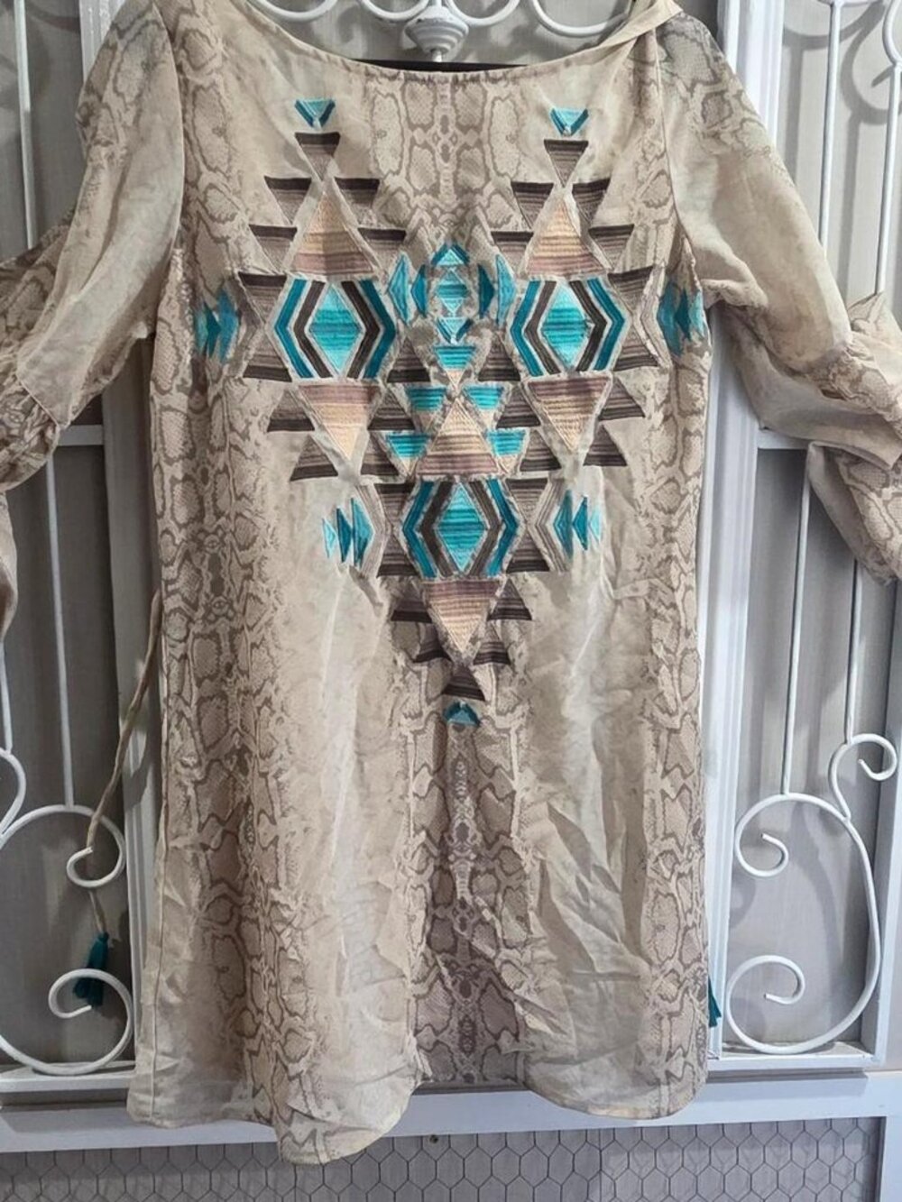 Judith March cream snake print dress with tassel detail. Size M
